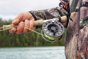 fisherman-fishing-reel-river-39854